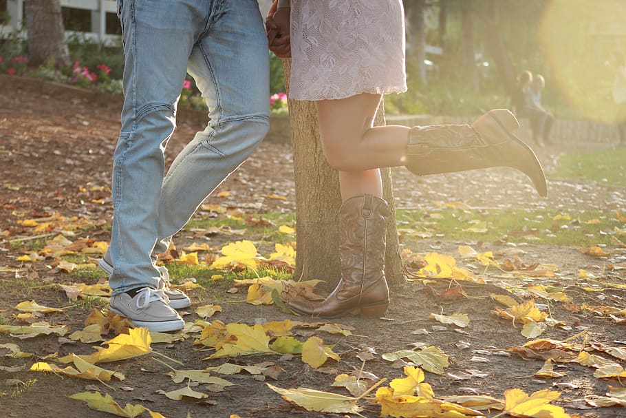 engagement, autumn, cowboy boots, love, couple, romance, romantic, leaves, jeans, sneakers