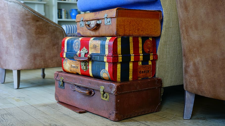 three, assorted-color luggage bags, assorted, stacked, suitcases, grey, wooden, floor, still, items
