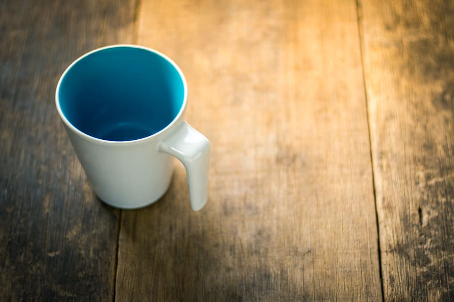 white, blue, ceramic, mug, brown, wooden, surface, cup, top, view