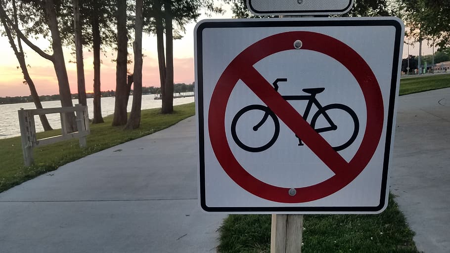 public sign, michigan, lake, sunset, lakefront, no bicycles, do not bike, water, prohibited, symbol