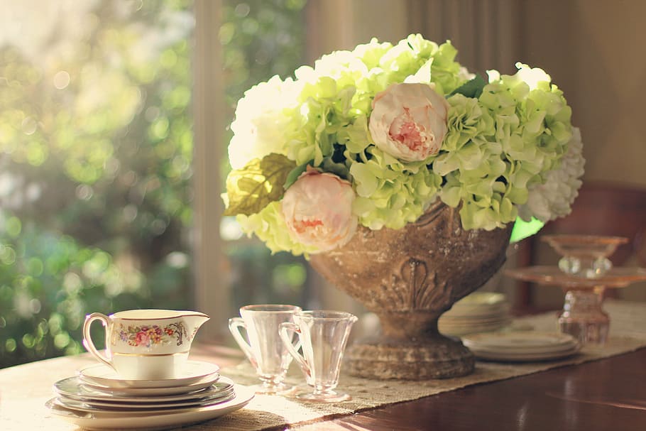 green, hydrangea, pink, buttercup flower arrangement, clear, glasses, table setting, vintage dishes, vintage china, flowers