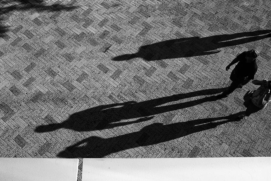 grayscale photo, two, person, walking, pavement, floor, black, white, people, shadow