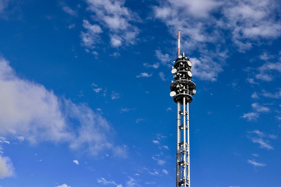 radio, tower, telecommunications, antenna, wireless, sky, low angle view, cloud - sky, built structure, architecture