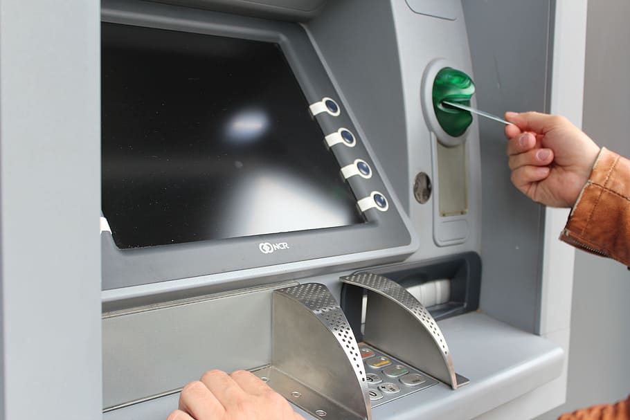 person, holding, card, atm, withdraw cash, map, ec card, card slot, human hand, human body part