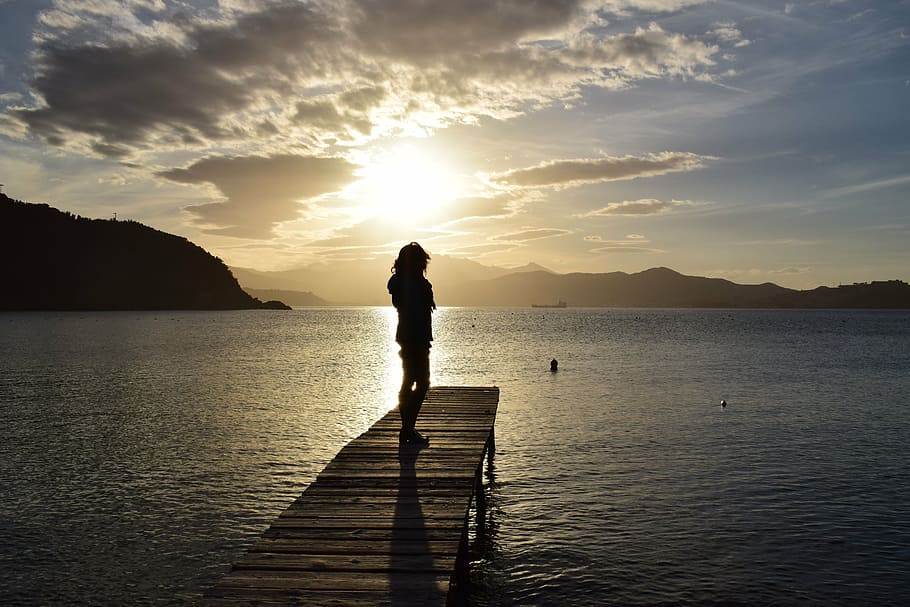silhouette, woman, standing, wooden, dock, sea, ocean, water, waves, nature