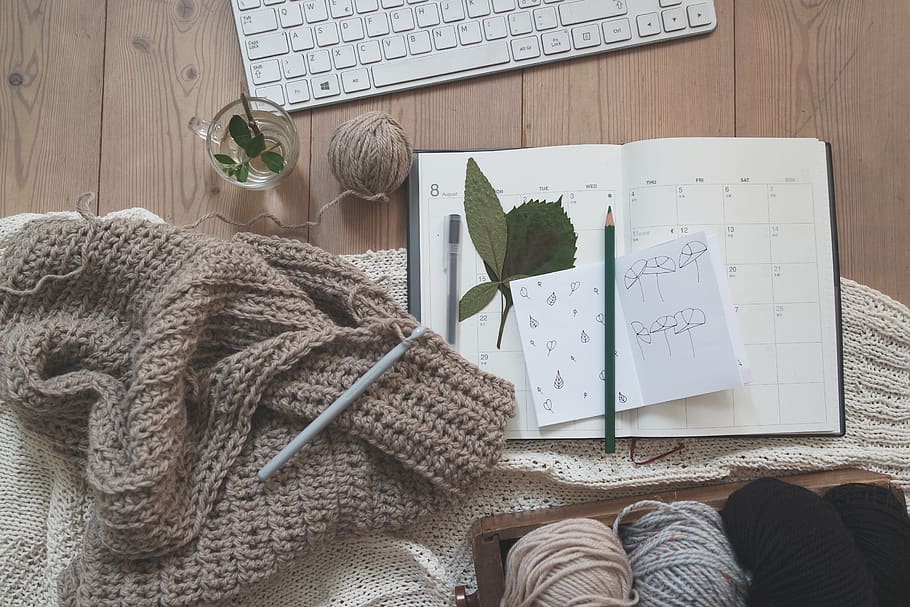yarn, thread, knitting, clothing, pen, paper, notebook, leaf, keyboard, table