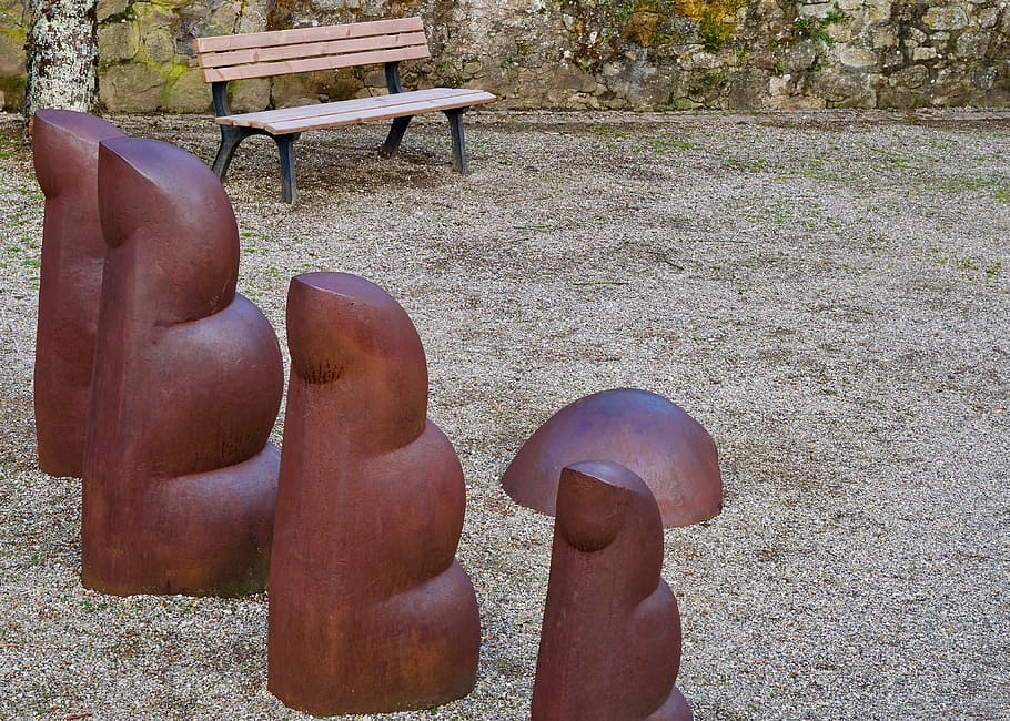 park, finger, hand, sculpture, park bench, artwork, metal, seat, day, nature