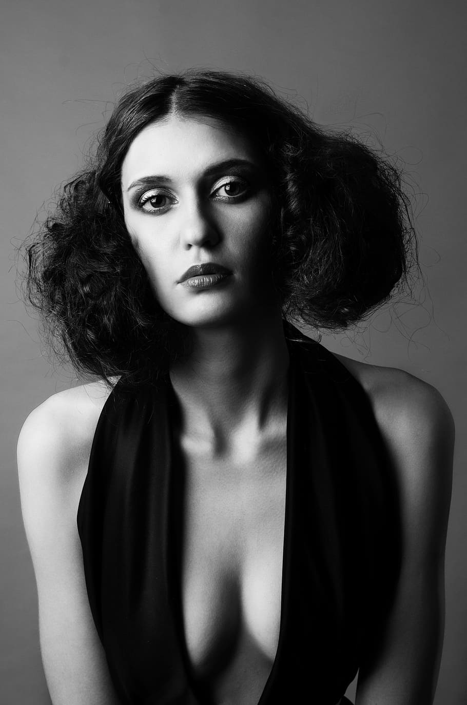 grayscale photography, woman, wearing, deep, v-neck halter, top, nothing, anything, something, beauty