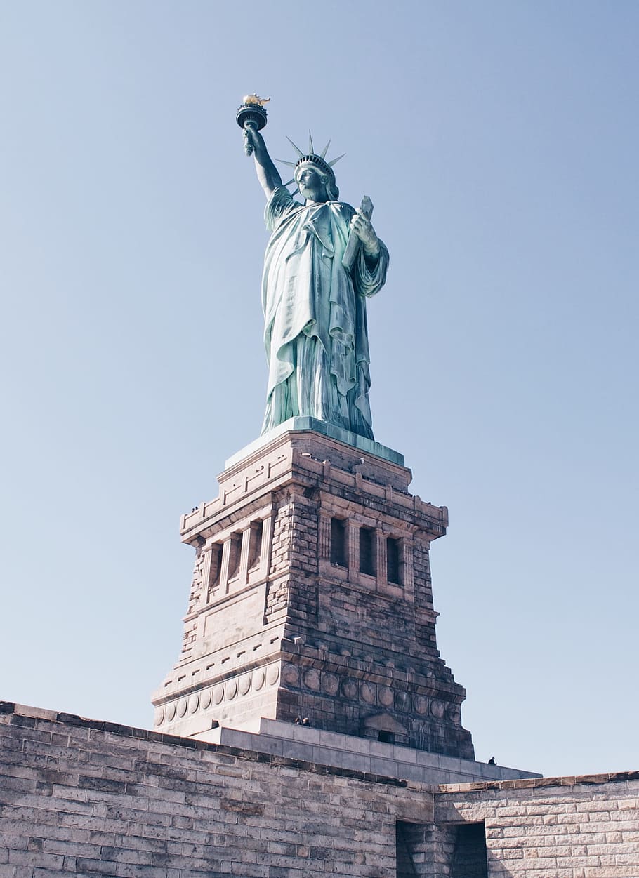lady liberty, liberty island, new york, sculpture, sky, low angle view, travel destinations, statue, clear sky, art and craft
