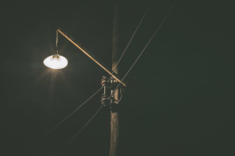 turned-on lamp post, post, power, lines, light, dark, power lines, night, evening, wood