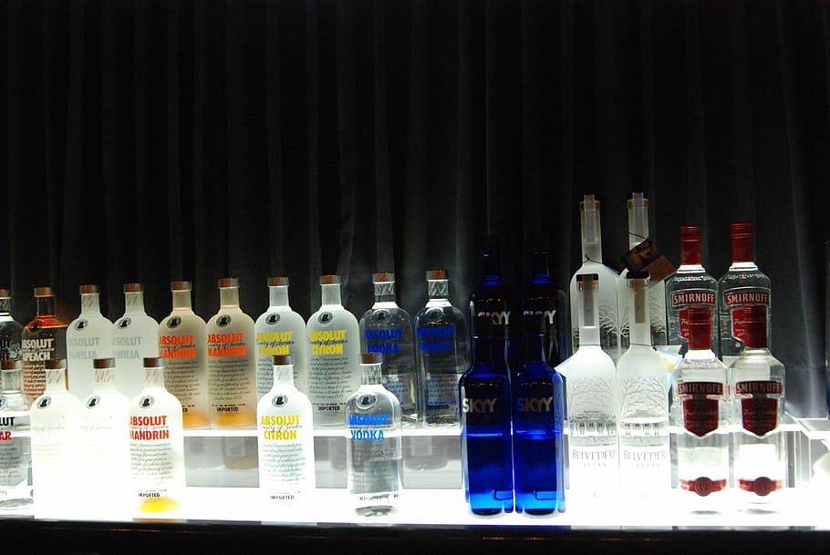 beverage bottle lot, bar, vodka, alcohol, drinks, cocktail, drink, bottle, container, large group of objects