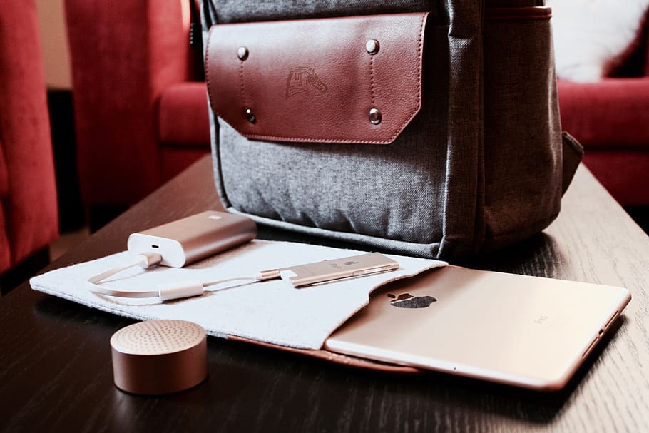 silver power bank, bag, ipad, brown, wooden, table, cafe, apple, food, sweet