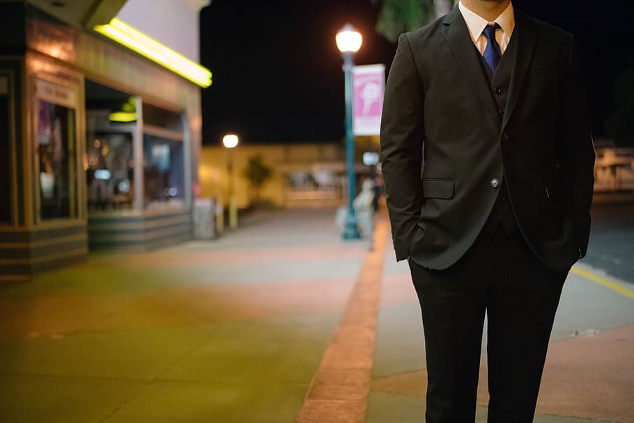 man, wearing, 2-piece, 2- piece suit, set, standing, building, corporate, businessman, suit