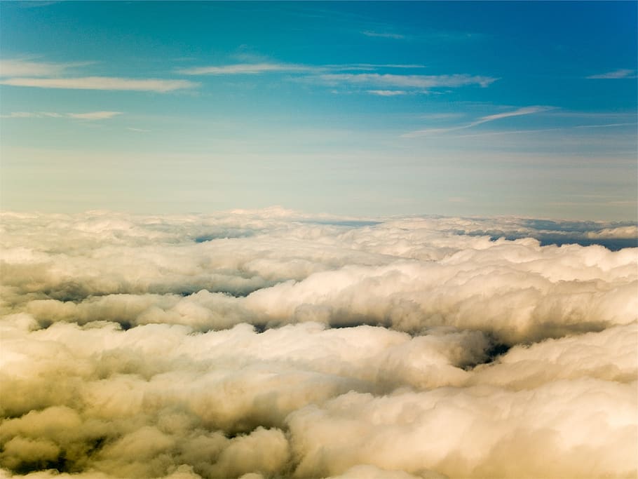 above the clouds, blue, sky, sunny, cloud - sky, beauty in nature, scenics - nature, tranquil scene, tranquility, cloudscape