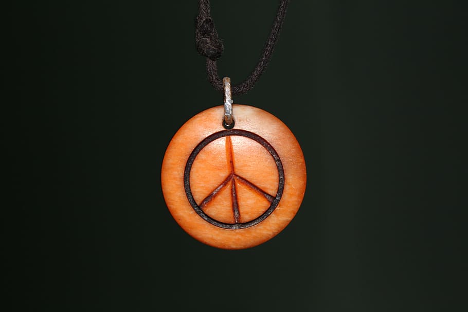 Peace, Vibe, Jah, fruit, black background, hanging, indoors, close-up, orange color, studio shot