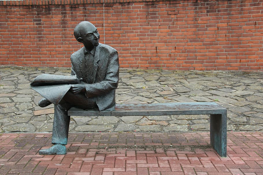 man, sitting, bench, holding, paper statue, newspaper, read, information, news, inform