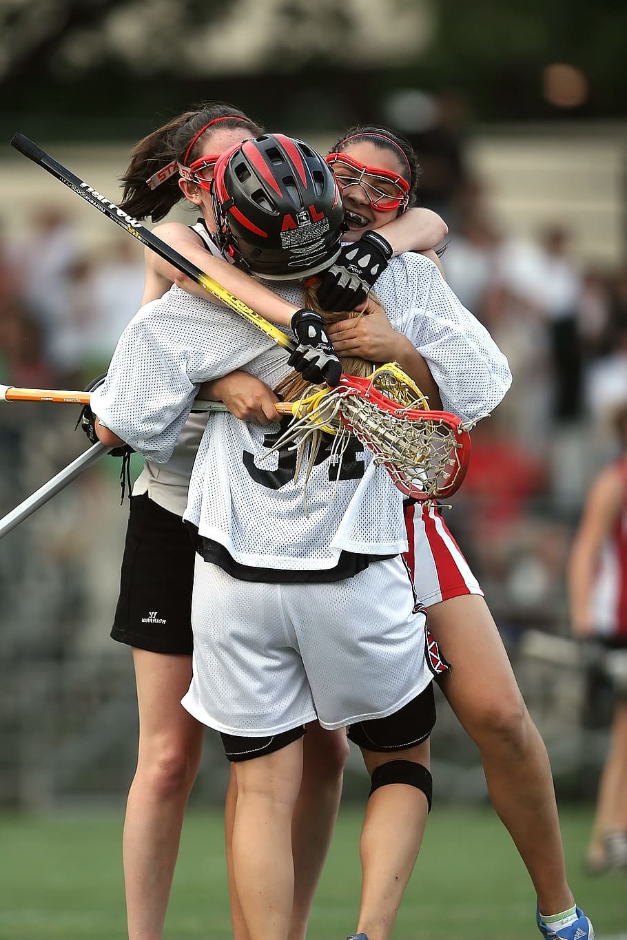 three, people, hugging, daytime, lacrosse, lax, sport, stick, equipment, competition