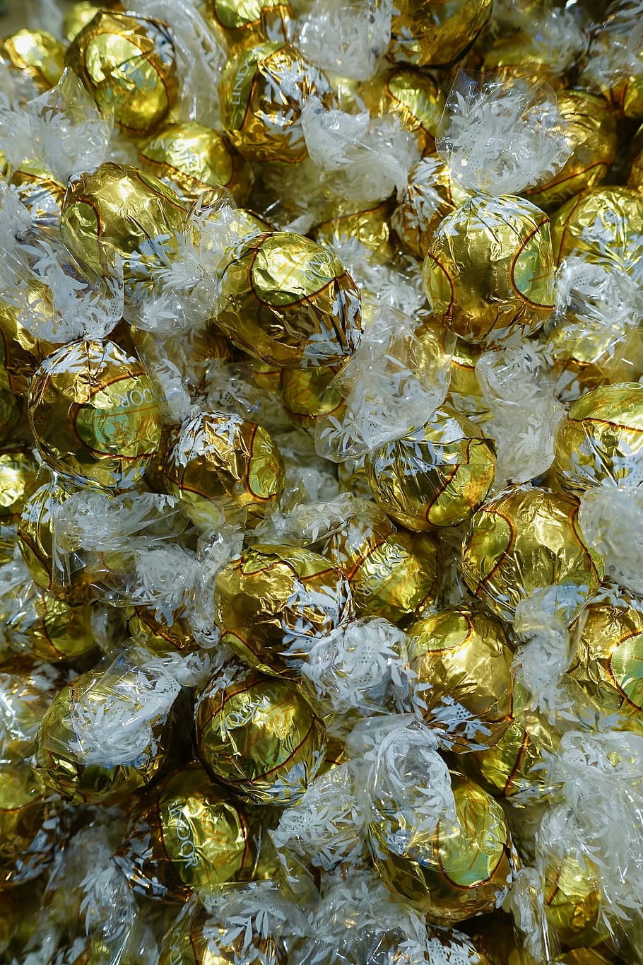 sweets, chocolate, candy, balls, wrapped, bonbon, confection, bright, yellow, full frame