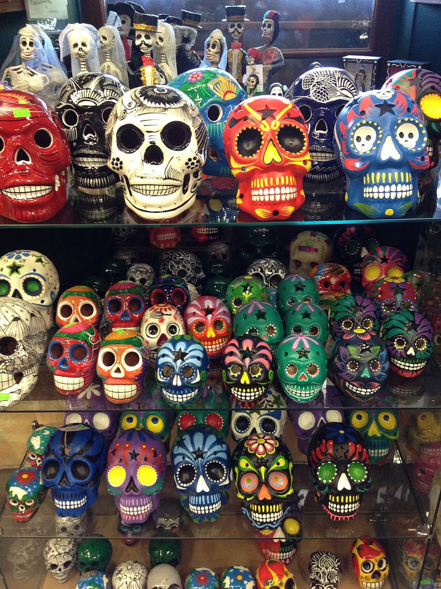 assorted-color calavera lot, shelf, sugar skulls, day of the dead, skull, colorful, sugar, dead, mexican, muertos