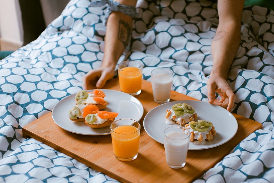 food, breakfast in bed, juice, glass, serve, preparation, people, man, hands, couple