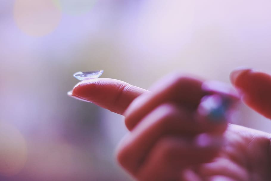 contact lens, tip, persons index finger, persons, index finger, human Hand, close-up, people, defocused, human Finger