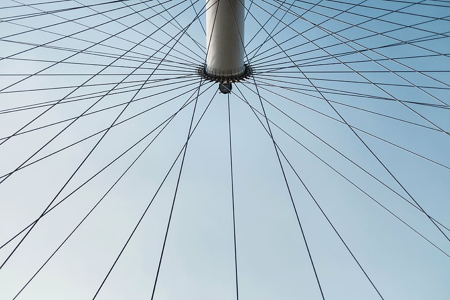 white bike wheel, gray, bicycle, wheel, blue, sky, architecture, low angle view, full frame, day