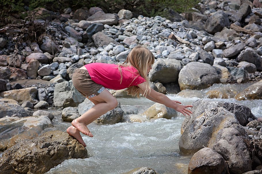 girl, rock, jumping, reaching, another, stone, human, person, child, barefoot