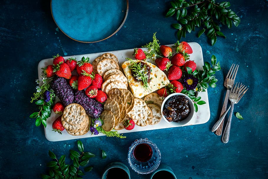 strawberries on plate, strawberries, biscuit, crackers, tea, drink, wine, foods, table, restaurant