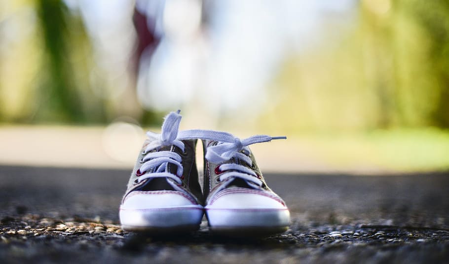 pair, grey, sneakers, concrete, floor, baby shoes, outdoor, spring day, waiting, day