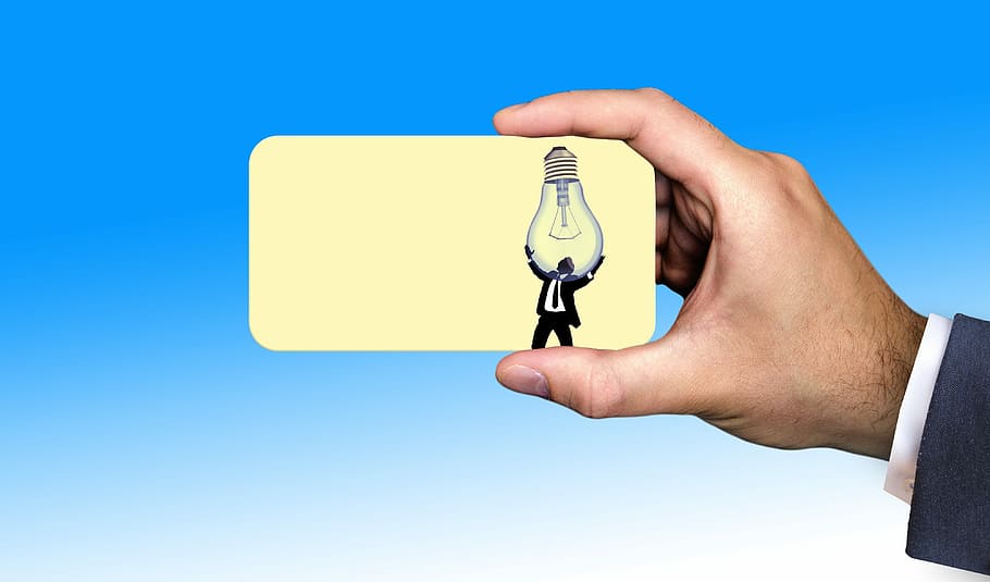 person, holding, business card, business, businessman, pear, light bulb, sun, solar energy, light