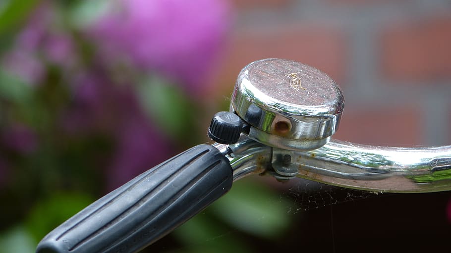 shiny, metallic, chrome, focus on foreground, close-up, metal, silver colored, day, outdoors, security