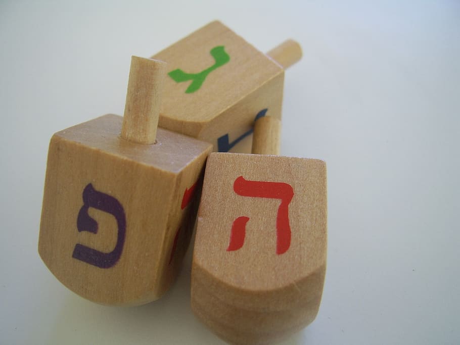 three, beige, red, green, wooden, blocks, panel, dreidels, hanukkah, spinning tops