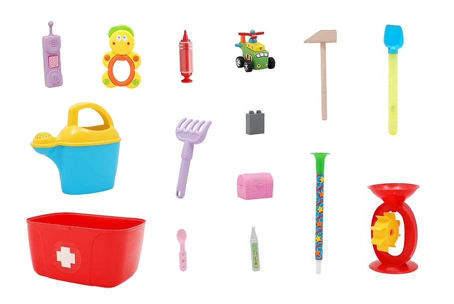 assorted-color toy lot, toys, plastic, close-up, child, playing, phone, toy, syringe, helicopter