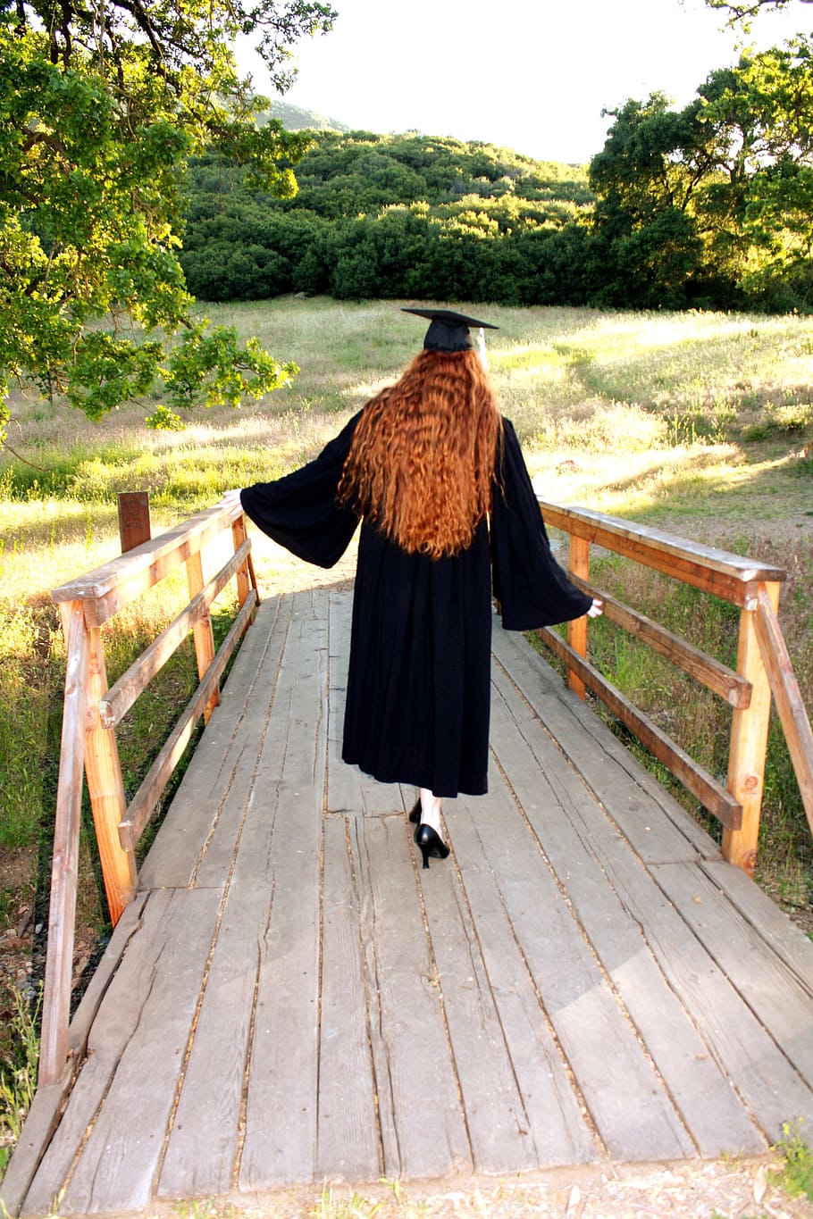 woman, black, graduation dress, brown, wooden, bridge, daytime, woman in black, graduation, dress