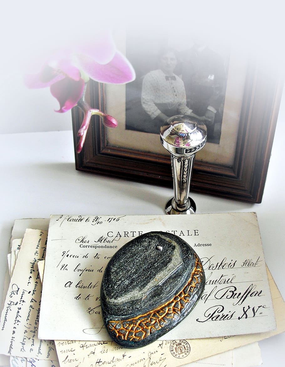 lucky stone, paperweight, leave, romance, text, indoors, table, publication, communication, still life
