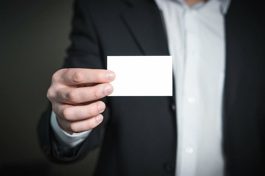 person, holds, white, card, business card, business, man, holding, hand, suit