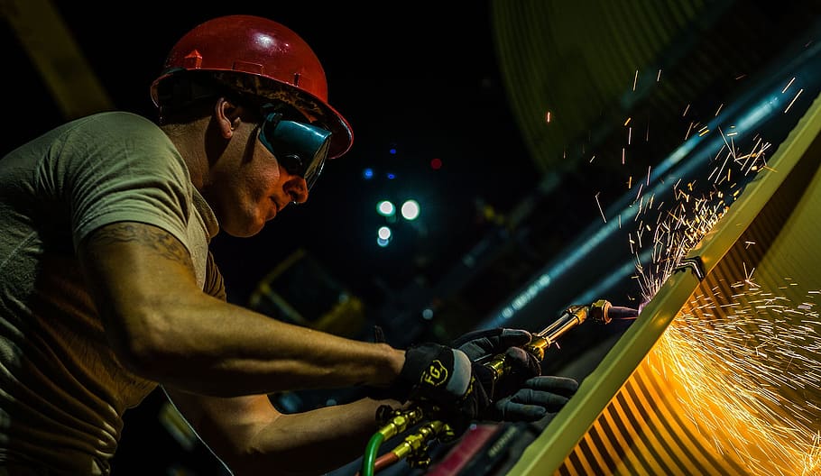 man, wearing, black, goggles, red, hard, hat welding metal, construction, worker, torch