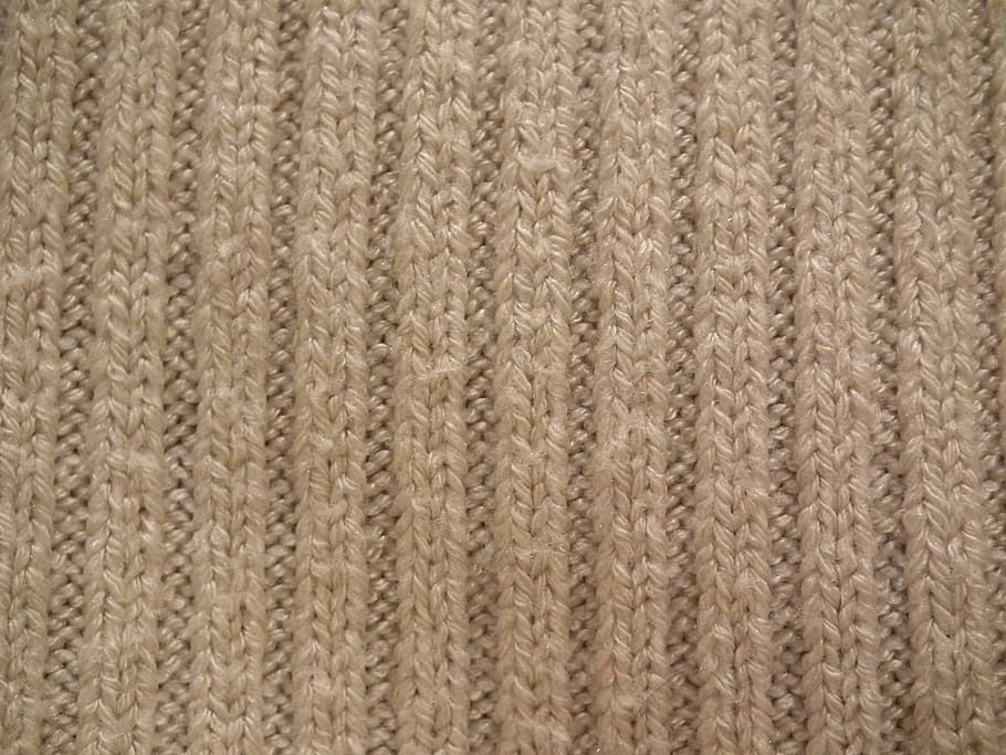 brown knitted textile, fabric, knitted, material, knitted wear, wool, knitting, sweater, background, beige