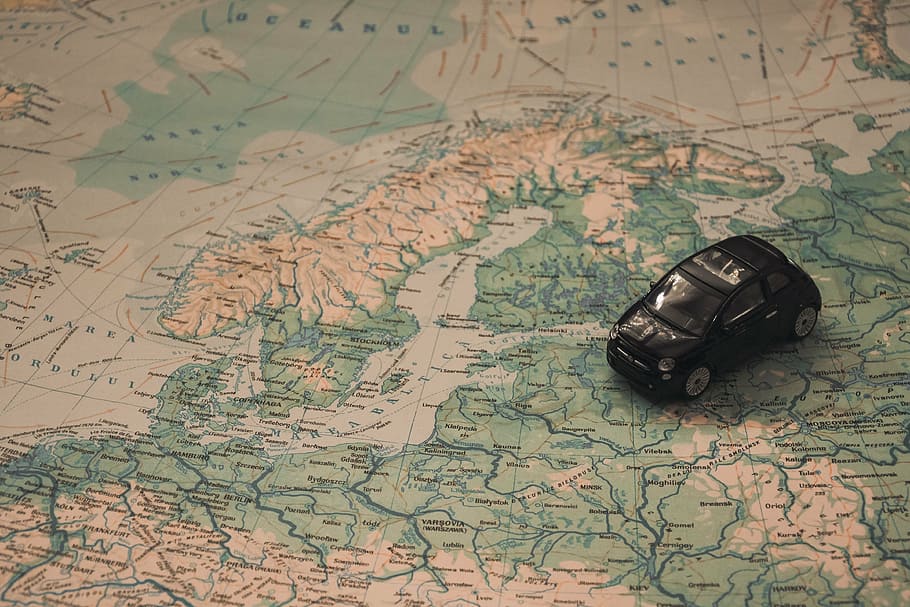 black, hatchback die-cast model, map, holidays, car, travel, route, adventure, scandinavia, toy