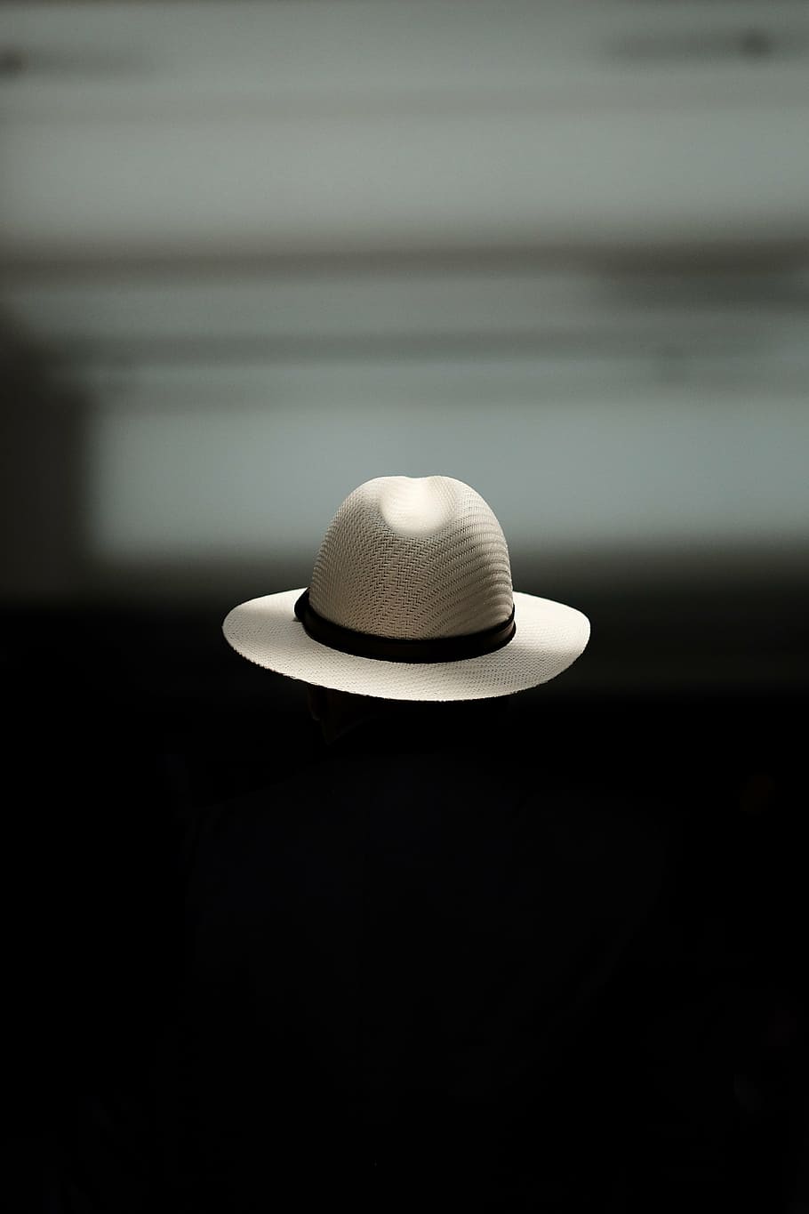 hat, black, background wallpaper, people, dark, room, cap, fashion, indoors, lighting equipment