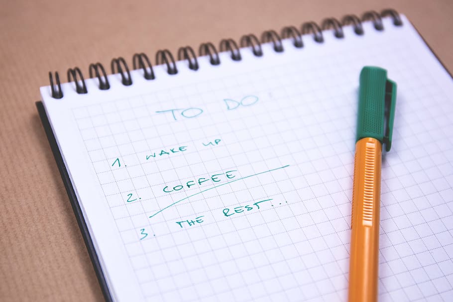 brown-green-ballpoint-pen-to-do-list-checklist-notepad-notebook