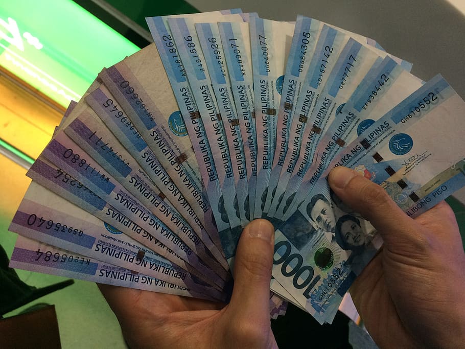 person, holding, bundle, 1000 philippine peso banknotes, Silver ...