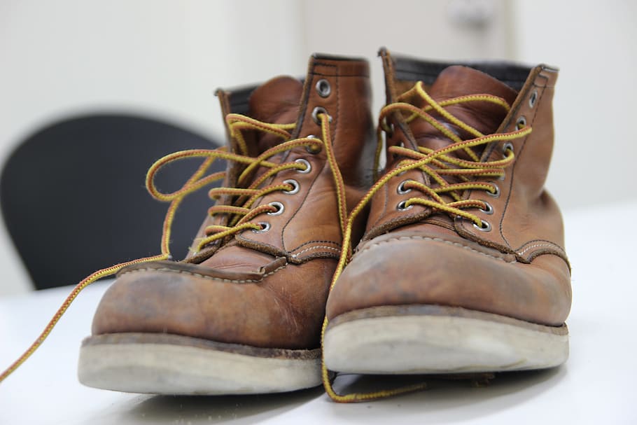 pair, brown, leather lace-up shoes, white, panel board, selective, focus photography, boots, work boots, shoes