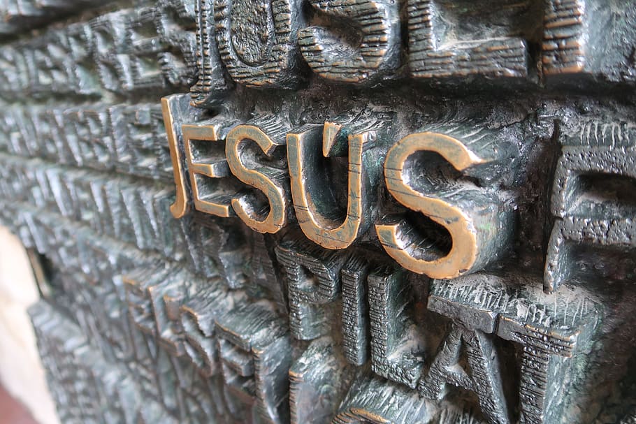 jesus word sculpture, gaudi, barcelona, gaudi cathedral, the apartment emilia, la sagrada familia, jesus, text, close-up, metal
