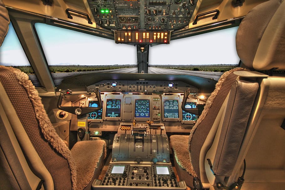 aiplane pilot's room, pilot, room, cockpit, plane, airplane, jet, passenger, seats, console