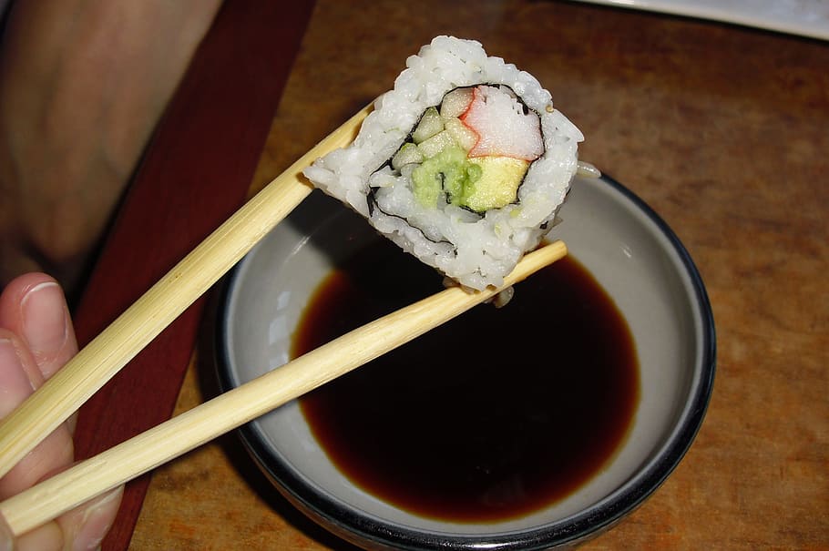 person, using, chopstick, holding, sushi, japanese, chopsticks, soy, sauce, seafood