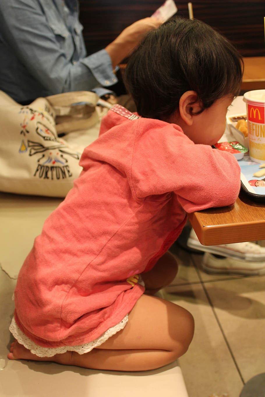 baby girl, child, anger, discontent, waiting, sitting at the table, lunch, fast-food, mcdonalds, tokyo
