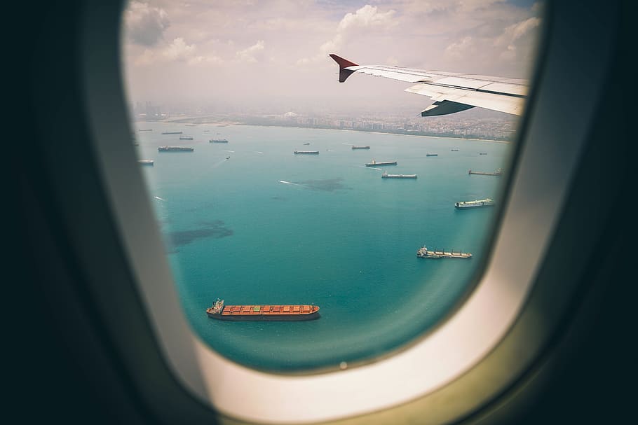 view, inside, airplane, daytime, window, airline, travel, trip, sky, sea