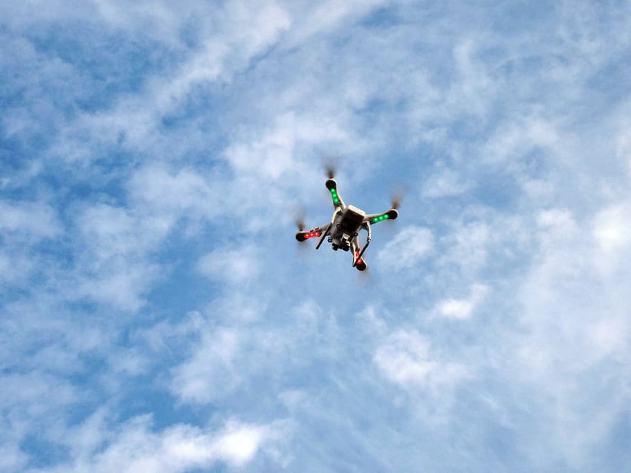 white, low-angle photography, multicolored, quadcopter, mid, air, clouds, blue, sky, daytime