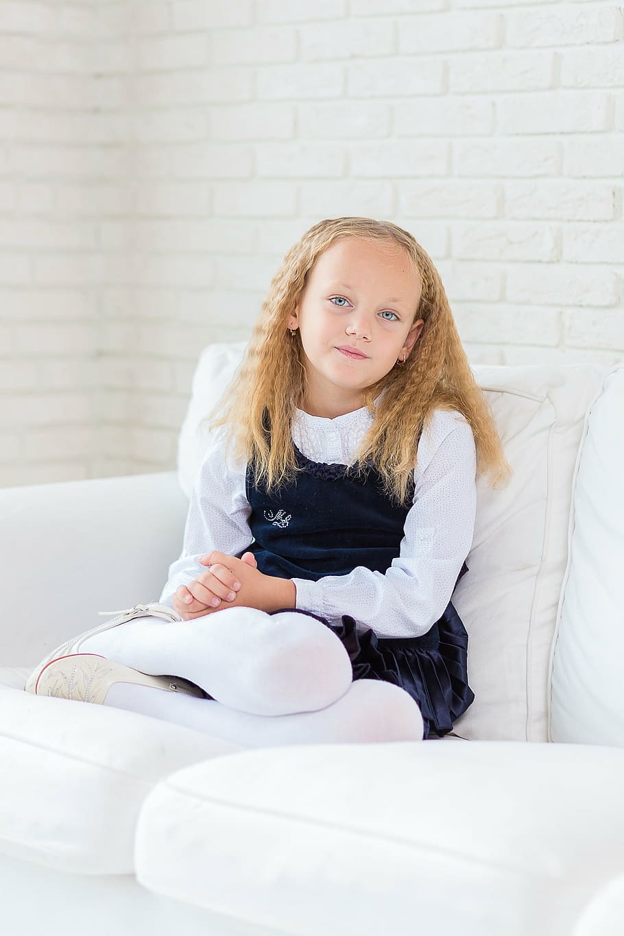 girl, sitting, couch, child, young, pretty, room, white, cute, happy